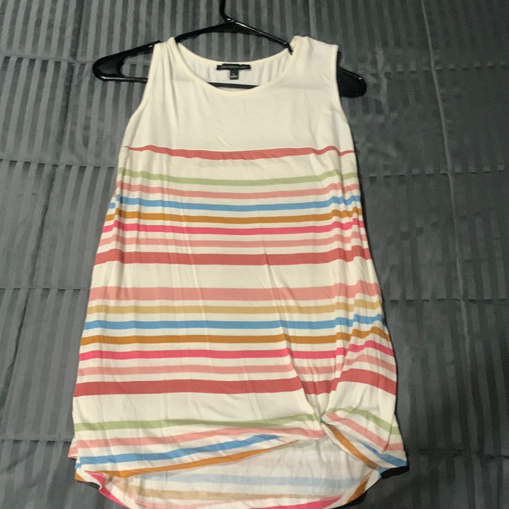 Never worn sleeveless shirt with gathered bottom